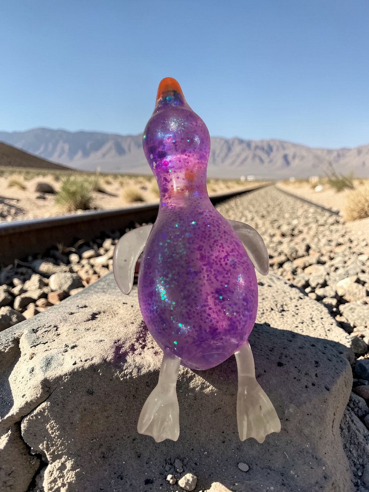 PURPLE GITTER DUCKIE